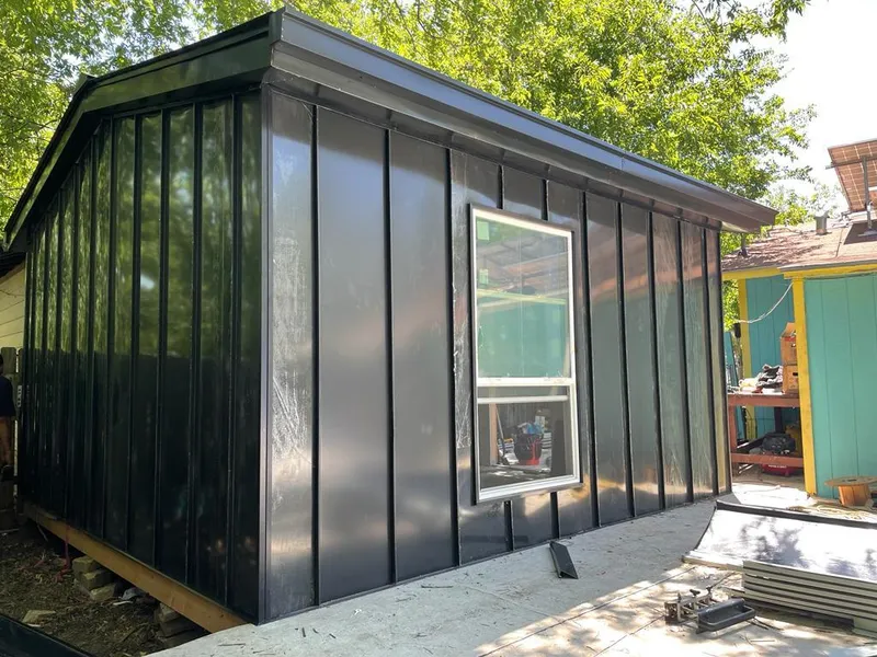 Black standing seam metal wall panels for Metal Roof Installation in Boxford