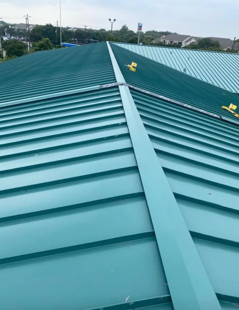 Green commercial metal roof ridge and valley for Metal Roof Repair in Boxford